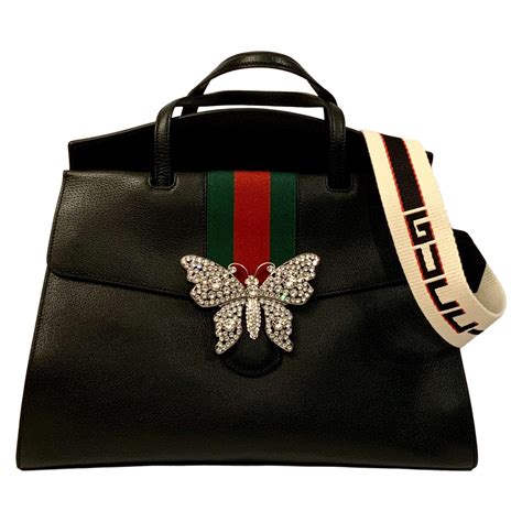 gucci camouflage butterfly bags|Gucci handbag with butterfly.